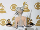 Lady Gaga poses with her awards