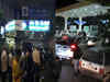 Money mayhem: Long queues outside ATMs, petrol pumps