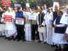 Opposition parties protest outside Parliament over note ban