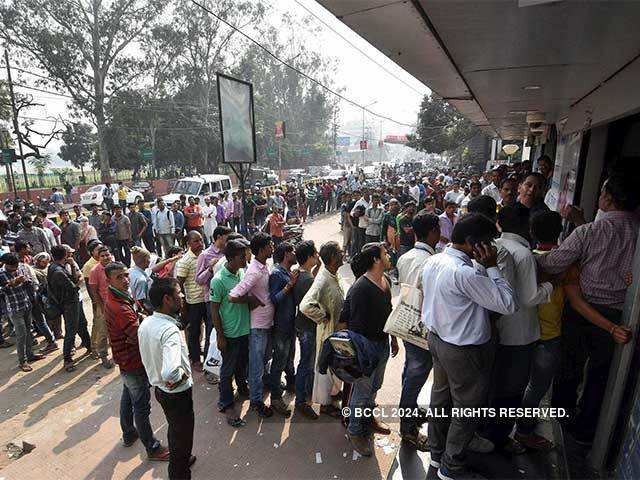 Daily wage earners stand in queue for others in UP