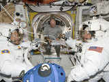 Astronauts and spacewalkers inside ISS