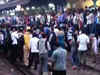 Passengers protest on rail tracks near Mumbai