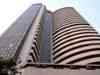 Markets open flat on mixed global cues
