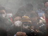 China extends orange alert as thick smog chokes Beijing