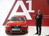 Audi CEO Stadler poses next to new Audi A1