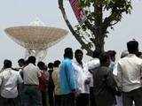 People gather outside ISRO's Byalalu Centre