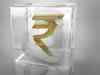 Rupee opens 11 paise higher at 67.20 against US dollar