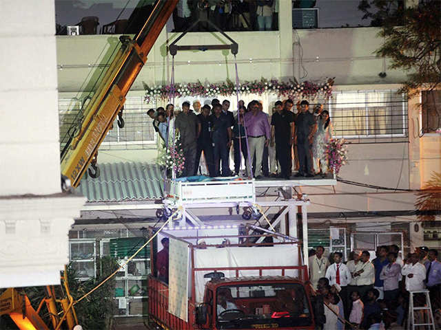 Eman being lifted by crane at the hospital
