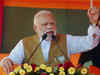 Modi sings development mantra after being accused of communal politics