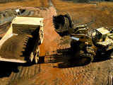 A haul truck is loaded with iron ore at a BHP Billiton mine in West Australia's Pilbara region