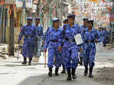 RAF personnel patrol street