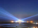 Discovery streaks across the sky