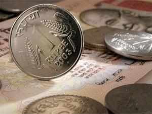 Rupee gains 20 paise to end at 1-1/2 week high against dollar
