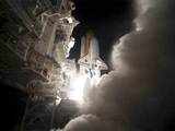 Exhaust cloud billows around Launch Pad 39A