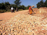 Villagers work to build a state highway