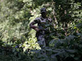 A policeman conducting anti-mining operations