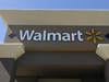 Wal-Mart looks at online presence, Amazon considers offline stores