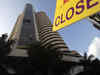 Sensex ends flat after choppy trade; SBI slips 2%