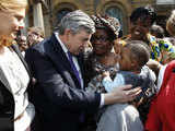 Gordon Brown with wife meet churchgoers