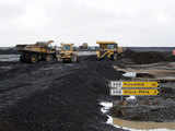 Workers clear volcanic ash