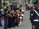 Bhutanese school girls wait for dignitaries