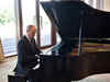 Putin reveals his musical side, plays piano in China