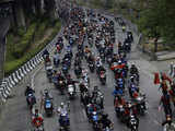 Anti-govt protestors ride motorbikes