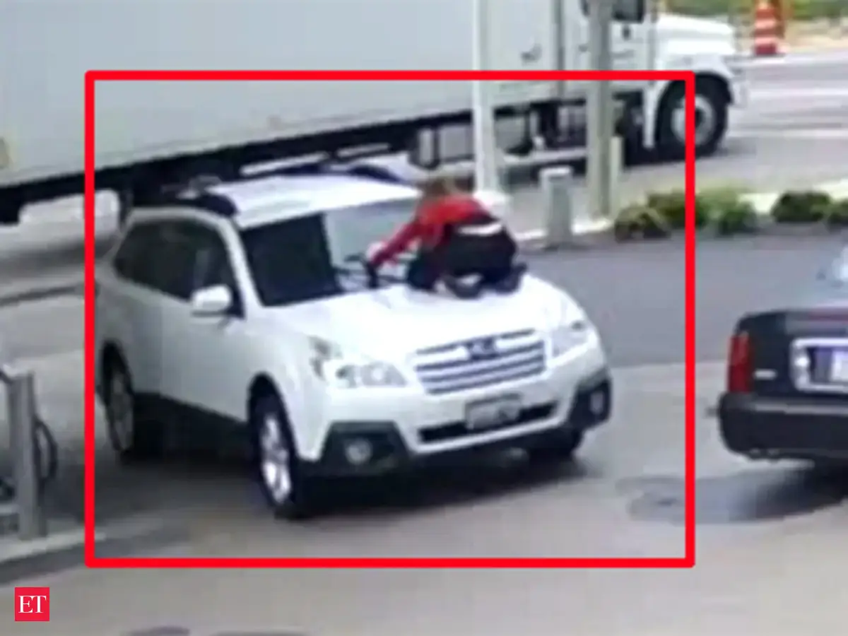 On cam: Woman jumps on hood of car to stop carjacking attempt - The ...