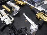 Gold and silver plated firearms