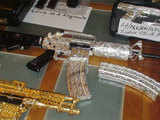 Gold and silver-plated, diamond-encrusted guns 