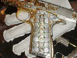 Gold and silver-plated, diamond-incrusted guns 