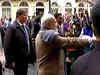 PM Modi greets people outside hotel in Russia