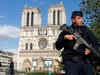 Police shoot hammer-wielding man at Paris cathedral