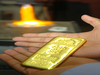 Gold, silver trade lower on profit booking