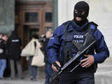 A Belgian police officer stands guard