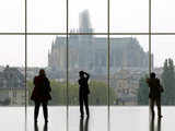 Visitors look at the Metz Cathedral