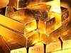 Gold futures surge to record high on firm global cues