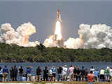 Space Shuttle Atlantis lifts off