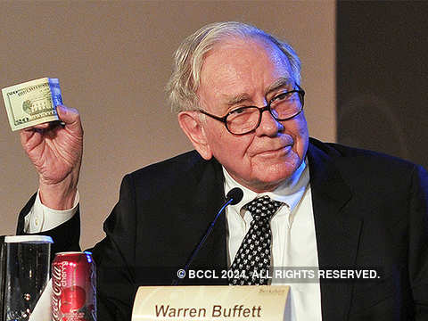 Warren Buffet: Warren Buffet's life hacks: No smartphone, 5 bottles of Coke  every day, and an old Cadillac | The Economic Times