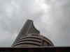 Markets trade lower; LIC loses 7,000 cr in 30 mins