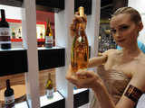 A model displays wine from China at VINEXPO Asia-Pacific