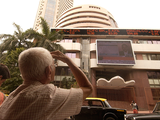 Sensex hits record high, Nifty50 at kissing distance of 10,000