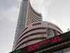 Markets cold to RBI rate cut; Sensex, Nifty close in the red