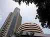 Sensex sheds over 100 pts; Nifty below 9,900; Tata Motors, ONGC top losers