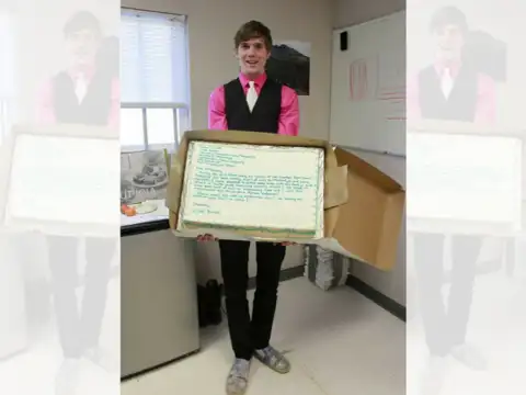 Neil Berrett's resignation letter...on a giant sheet cake