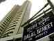 Sensex ends marginally higher; Nifty fails to hold 9,800