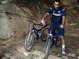 Dhoni rides a bicycle in Sri Lanka