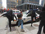 Protestors smash police vehicles