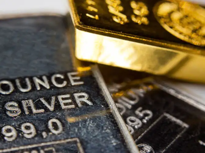 Gold, silver down in morning trade