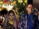 Mahendra Dhoni with his bride Sakshi Rawat
